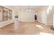 Spacious open-concept living area with archways, light flooring, and abundant natural light at 17458 W Wandering Creek Rd, Goodyear, AZ 85338