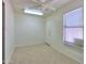 Bright bonus room with tile flooring, ceiling fan, and natural light at 1778 E Bishop Pl, Casa Grande, AZ 85122