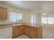 A bright kitchen has ample counter space, an island, and plenty of cabinets for storage space at 1778 E Bishop Pl, Casa Grande, AZ 85122