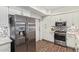 Well-equipped kitchen featuring stainless steel appliances, stylish backsplash, and ample cabinet space at 17850 N 68Th St # 1037, Phoenix, AZ 85054