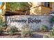 Stone sign with 'Monterey Ridge' lettering surrounded by mature landscaping at 17850 N 68Th St # 1037, Phoenix, AZ 85054