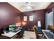 Home office with dual desk setup and modern decor at 18237 W Port Au Prince Ln, Surprise, AZ 85388