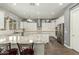 Spacious kitchen with a large island, stainless appliances, and pendant lighting at 18483 W Paradise Ln, Surprise, AZ 85388