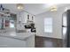 Modern kitchen featuring white cabinets, stainless appliances, and a sleek design at 201 S Greenfield Rd # 255, Mesa, AZ 85206