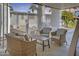 Inviting patio with comfortable wicker furniture, perfect for outdoor relaxation at 201 S Greenfield Rd # 255, Mesa, AZ 85206