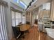 Kitchen with adjacent dining area featuring clerestory windows at 2072 W Klamath Ave, Apache Junction, AZ 85119