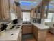 Functional kitchen with a clean aesthetic and plenty of natural light at 2072 W Klamath Ave, Apache Junction, AZ 85119