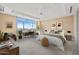 Bright bedroom with a large window, a desk, and a comfortable seating area at 2211 E Camelback Rd # 604, Phoenix, AZ 85016