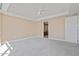 Cozy bedroom with plush carpeting, ceiling fan, en suite bathroom, and neutral walls creating a serene atmosphere at 2211 E Camelback Rd # 604, Phoenix, AZ 85016