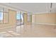 A spacious living room with travertine floors and neutral colors is move-in ready at 2211 E Camelback Rd # 604, Phoenix, AZ 85016