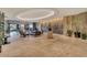 Grand lobby adorned with modern lighting, comfortable seating, and artistic waterfall design at 2211 E Camelback Rd # 604, Phoenix, AZ 85016