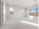 Bright bedroom with large windows and neutral carpet, creating a serene and inviting space at 26930 W Renee Dr, Buckeye, AZ 85396