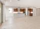 Spacious kitchen features a large island, stainless steel appliances, and custom cabinetry at 26930 W Renee Dr, Buckeye, AZ 85396