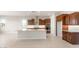 Gourmet kitchen features custom cabinetry, large center island, and stainless steel appliances at 26930 W Renee Dr, Buckeye, AZ 85396