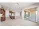 Open concept living area with tile floors and sliding doors to the patio, great flow and space at 26930 W Renee Dr, Buckeye, AZ 85396