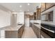 Open kitchen with stainless appliances, granite countertops, and ample cabinet space at 26942 W Renee Dr, Buckeye, AZ 85396