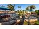 Enjoy the community pool's cabanas, seating, and well-maintained landscaping for relaxation and socializing at 2717 W Medina Ave, Mesa, AZ 85202