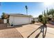 Two car garage with desert landscaping in the front of this well maintained property at 2717 W Medina Ave, Mesa, AZ 85202