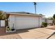 Two car garage with desert landscaping in the front of this well maintained property at 2717 W Medina Ave, Mesa, AZ 85202