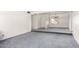 Spacious living area with neutral carpet and paint and multiple archways in this well maintained house at 2717 W Medina Ave, Mesa, AZ 85202