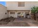 Back patio with slider and outdoor storage area at 3113 W Royal Palm Rd, Phoenix, AZ 85051
