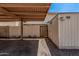 Covered carport with access gate to backyard at 3113 W Royal Palm Rd, Phoenix, AZ 85051