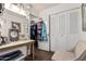 Spacious closet features ample storage with a desk, chair, and shelving at 3113 W Royal Palm Rd, Phoenix, AZ 85051