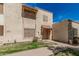 Charming townhome with a traditional desert landscape and cozy front patio at 3113 W Royal Palm Rd, Phoenix, AZ 85051