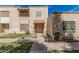 Charming townhome with a traditional desert landscape and cozy front patio at 3113 W Royal Palm Rd, Phoenix, AZ 85051