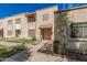Charming townhome with a traditional desert landscape and cozy front patio at 3113 W Royal Palm Rd, Phoenix, AZ 85051