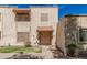 Charming townhome with a traditional desert landscape and cozy front patio at 3113 W Royal Palm Rd, Phoenix, AZ 85051