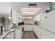 Well-equipped kitchen boasting modern appliances, updated countertops, and abundant natural light at 3113 W Royal Palm Rd, Phoenix, AZ 85051