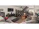 Inviting living room featuring an open staircase and comfortable seating at 3113 W Royal Palm Rd, Phoenix, AZ 85051