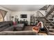 Inviting living room featuring an open staircase and comfortable seating at 3113 W Royal Palm Rd, Phoenix, AZ 85051