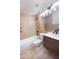 This bathroom features custom tiling, a modern vanity, and updated fixtures at 4038 E Wescott Dr, Phoenix, AZ 85050
