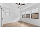 Light-filled bedroom with wood-look tile flooring and recessed lighting at 4383 N 203Rd Dr, Buckeye, AZ 85396