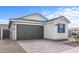 Beautiful single-Gathering home showcasing a neutral color palette and a two-car garage at 4383 N 203Rd Dr, Buckeye, AZ 85396