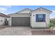 Charming single-Gathering home featuring a neutral color palette and a two-car garage at 4383 N 203Rd Dr, Buckeye, AZ 85396