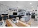 Open-concept living space with views of the kitchen, dining area, and comfortable seating at 4407 E Meadow West Ln, Queen Creek, AZ 85140