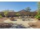 Spacious backyard with fire pit and patio set, perfect for outdoor gatherings and entertaining guests at 4415 W Ellis St, Laveen, AZ 85339