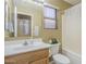 Bright bathroom with a single sink vanity, and a shower-tub combo, and natural light at 4415 W Ellis St, Laveen, AZ 85339