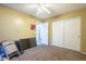 Bedroom offers closet space and a neutral color scheme, perfect for personalization at 4415 W Ellis St, Laveen, AZ 85339