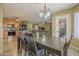 Cozy dining area with an open floor plan and an view of the kitchen at 4415 W Ellis St, Laveen, AZ 85339