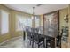 Inviting dining area with natural light and a view of the backyard at 4415 W Ellis St, Laveen, AZ 85339