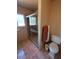 Bathroom featuring a glass shower, toilet, towel rack, and neutral tile flooring at 5829 E Windsor Ave, Scottsdale, AZ 85257