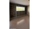 Bedroom featuring built-in shelves and a sunlit window at 5829 E Windsor Ave, Scottsdale, AZ 85257