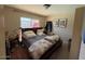 Inviting bedroom with cozy textiles and a sunny window at 5829 E Windsor Ave, Scottsdale, AZ 85257