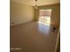 Clean bedroom with sliding glass doors leading to a patio at 5829 E Windsor Ave, Scottsdale, AZ 85257