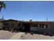 Charming home with stone accents and front yard landscaping at 5829 E Windsor Ave, Scottsdale, AZ 85257
