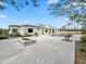 Backyard view of the pool, fire pit, and patio area of this modern home at 6129 E Turquoise Ave, Paradise Valley, AZ 85253